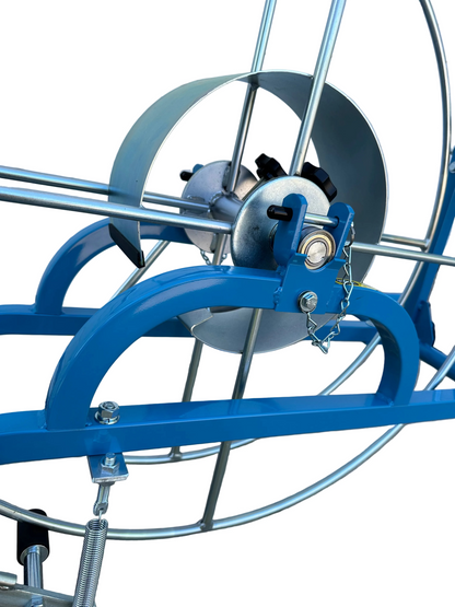 blue and silver Winder with red wheel and pneumatic tire for Sumi Rain irrigation tube. Sumi soaker max